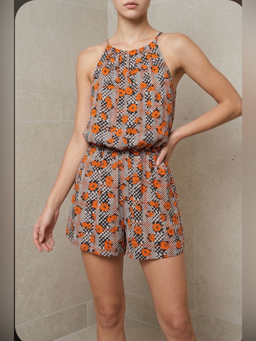 Lush Romper with button key hole back